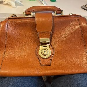 Designer bag complete with dust bag. Can be used as cross body.